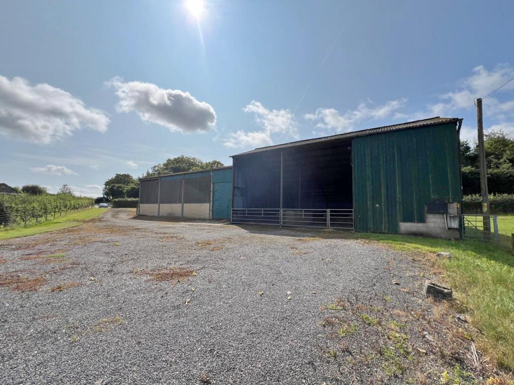 Lot: 75 - FARM BUILDINGS WITH POTENTIAL AND SIX ACRES IN A BEAUTIFUL RURAL SETTING - A Side on View of the Buildings